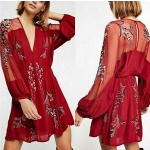 Embroidered dress with sheer sleeves